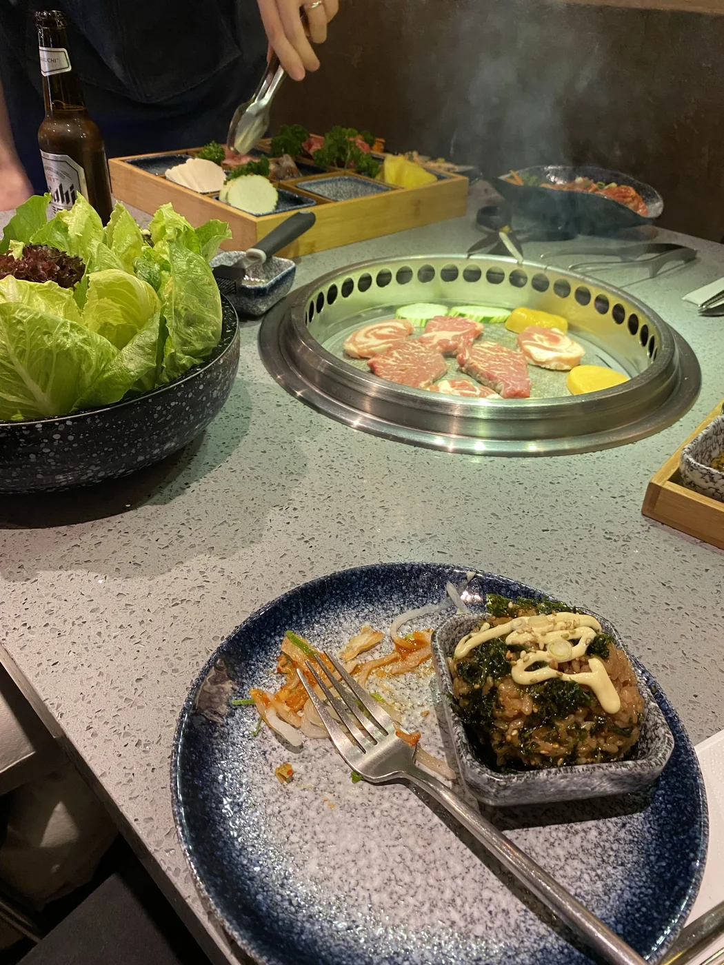 A shared dinner being prepared at the table
